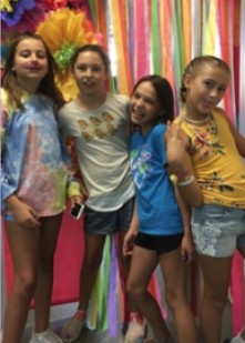 Kids having fun and posing for a picture at a back-to-school party